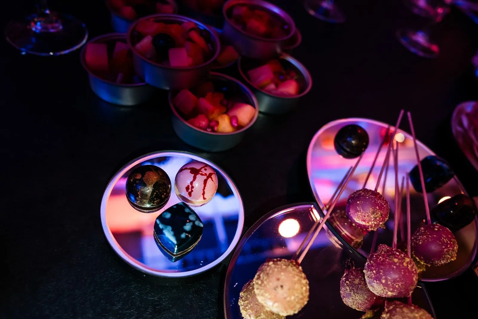Illuminated tables prepared for an evening catering event