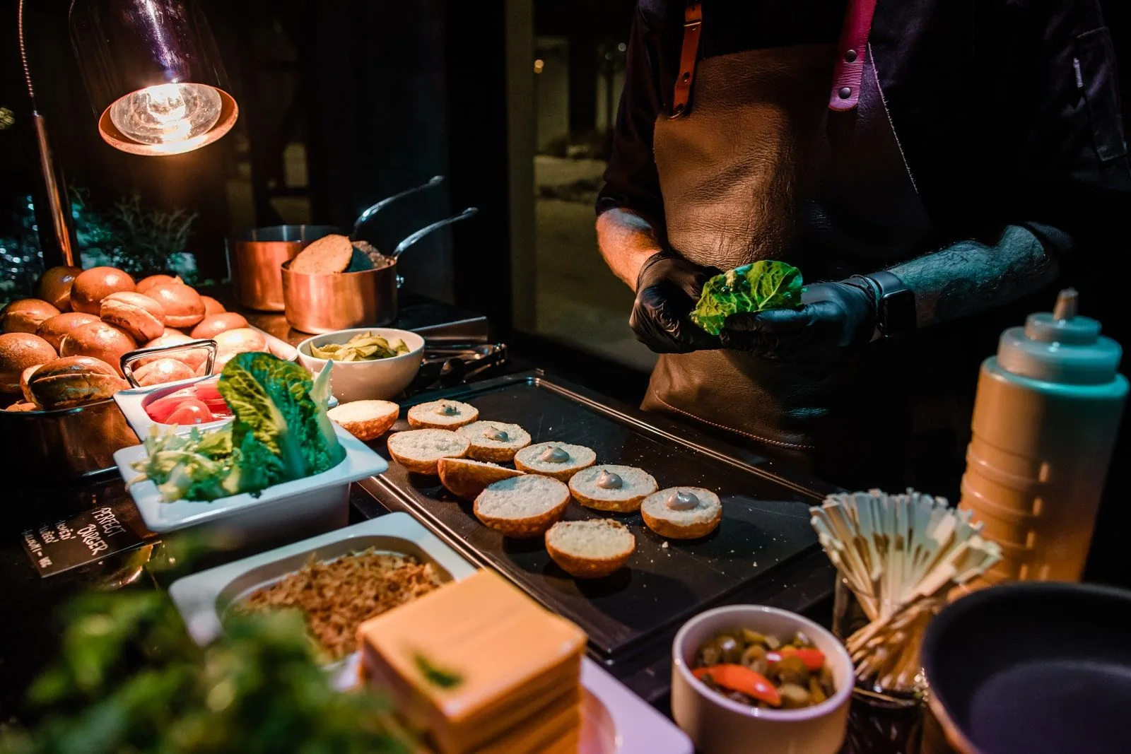 Chef preparing fresh ingredients at a catering event