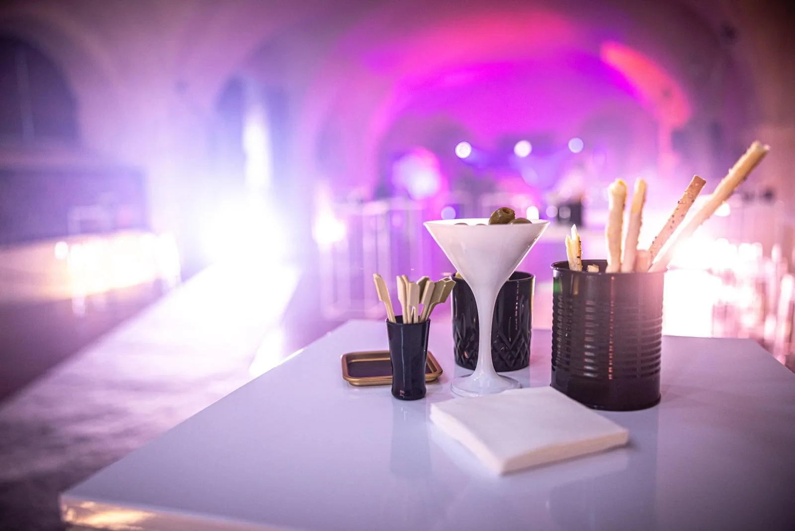 Cocktails prepared in an illuminated event bar