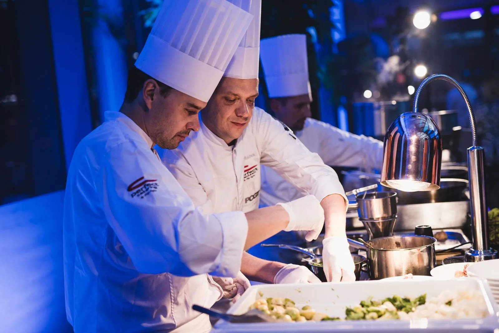 Chef team preparing an event menu
