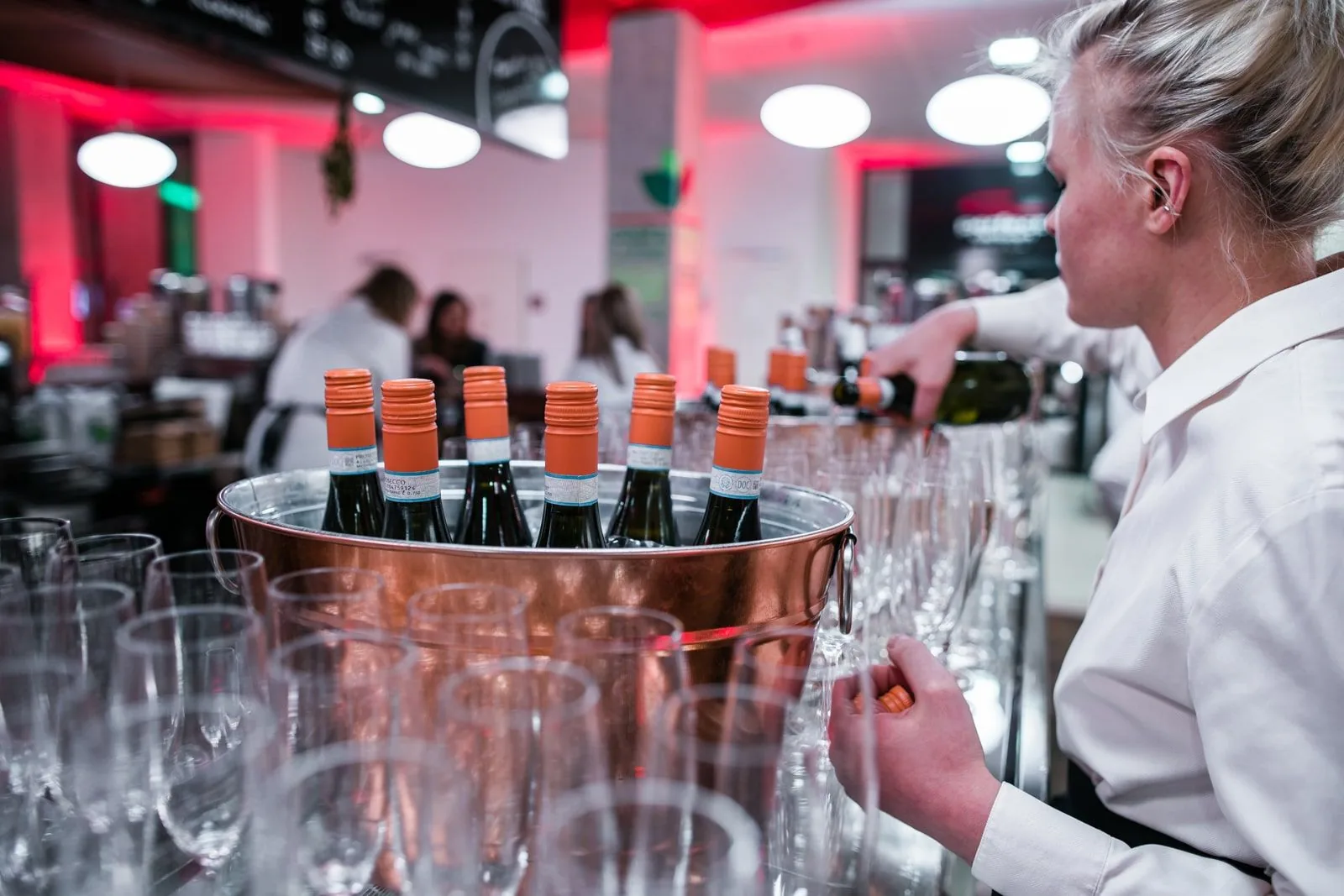 Bartender pouring drinks for corporate event guests
