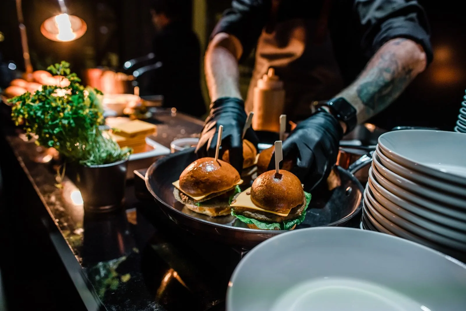 Chef finishing a course before service