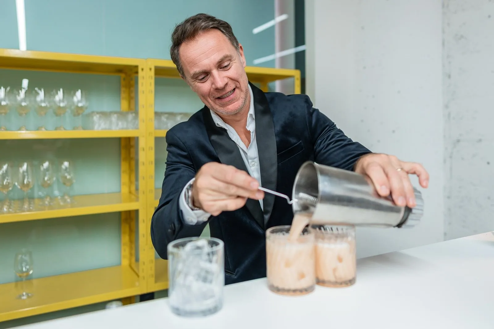 Bartender mixing drinks in a modern bar